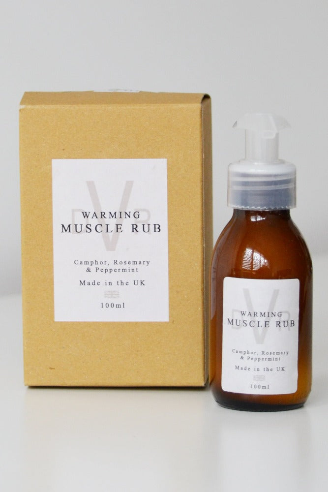DVR Warming muscle rub glass bottle sitting next to cardboard box packaging. Made in the UK. Camphor, Rosemary and Peppermint. 100ml.